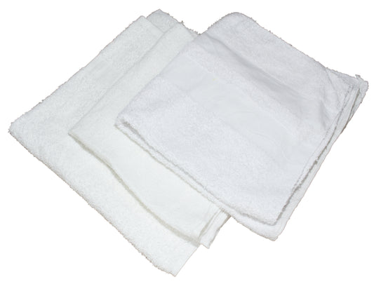 A stack of white half towels